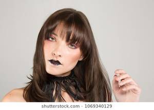 Heavy Lobster Porn - Young Brunette girl in a skimpy black dress with no heavy makeup and black  lipstickp