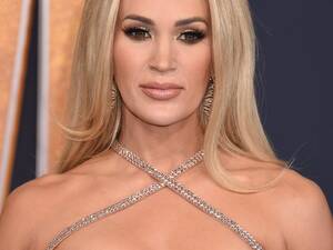 Carrie Underwood Porn Real - Carrie Underwood reveals she suffered heartbreaking family tragedy on  Grammys night despite big smiles on red carpet | The US Sun