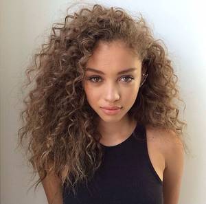 Beautiful Light Skin - Her hair is so gorgeous, even with the bit of frizz, my frizz does