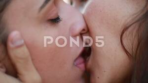 extreme lesbian kissing - Authentic LGBT lesbian kiss. Extreme mac... | Stock Video | Pond5
