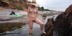 naked girls pissing on beach - Pee on The Beach - nude girl pissing on public beach - NUDIST extreme  public piss standing - Tnaflix.com