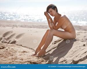 naked tanned beach girls sex - Woman Sitting on the Beach Nude Stock Image - Image of hair, legs: 12230241