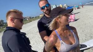 free nude beach videos - Woman detained by Myrtle Beach Police for wearing thong bikini