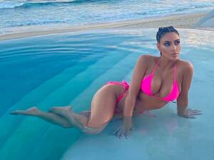 naked kim kardashian at beach - Kanye West Allegedly Showed Nude Kim Kardashian Pics to Adidas Staffers