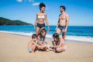 free beach vacation nude - Family Nudism Images - Free Download on Freepik