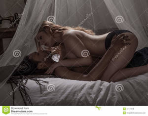 interracial couples making passionate love - Young passionate couple making love in bed