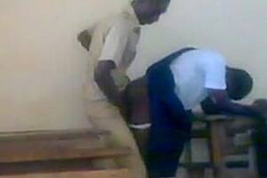 African Classroom - Teen African students fucking doggstyle in class
