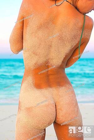 nude beach ass videos - Back view of a naked woman on a sandy beach, Stock Photo, Picture And  Royalty Free Image. Pic. SFC-986723 | agefotostock