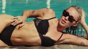 hot lesbian sex miley cyrus - Here's Why Miley Cyrus Fans Think 'Flowers' Is About Liam Hemsworth