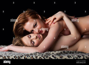 lesbian nudist camp sex - Two topless playful naked lesbian woman in bed - sexy couple Stock Photo -  Alamy