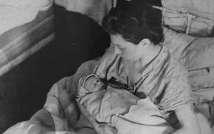 Nazi Pregnant Porn - A mother cradles her new born baby in the Kovno ghetto hospital. (United  States