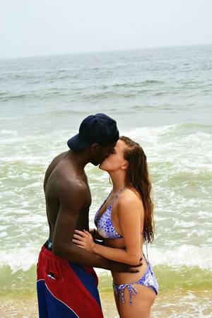 cuckold interracial holding hands - my wife kissing a nigga she met at the beachâ€¦