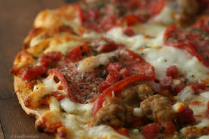 California Italian Porn - Prosciutto, Salami & Italian Sausage Thin Crust Pizza