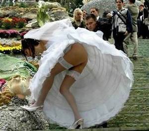 bride upskirt downblouse - sad because it's her wedding day, but funny because she forgot something! kn