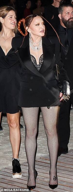 khlo+???+?t? kardashian upskirt - Madonna, 64, dons lingerie and wields riding crop at Sex book exhibition  during Miami Art Basel | Daily Mail Online