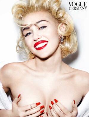 Miley Cyrus Nicki Minaj Porn - Miley Cyrus morphs into Madonna for topless German Vogue pose | The  Independent | The Independent