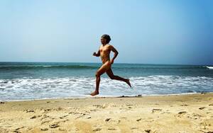 cumshots on nude beach - Milind Soman Runs Nude On The Goa Beach To Mark His 55th Birthday