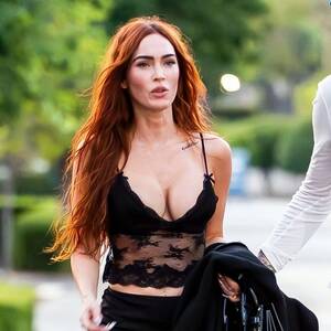 Megan Fox Sexy - Megan Fox parades curves as she spills out of teeny lace top and mini skirt  - Daily Star