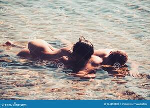 couples beach nude - Young Attractive Couple Having Sex on the Beach. Stock Image - Image of  female, chest: 144852809