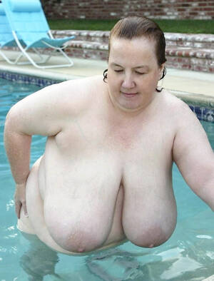 chubby nude pool - Fat mature nudist women swimming in a pool