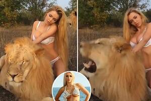 Katya Sambuca Russian Porn Star - Porn star Katya Sambuca poses semi naked straddling two LIONS that were  snarling and snapping in discomfort sparking animal rights outrage | The Sun