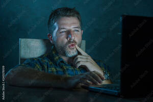 Internet Home Porn - young aroused and excited sex addict man watching porn mobile online in  laptop computer light night at home in pornography addiction internet  pornographic content Photos | Adobe Stock