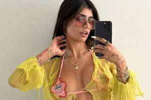 Miah Porn Star - Ex-porn star Mia Khalifa looks unrecognisable in adorable throwback snap of  'first communion' | The US Sun