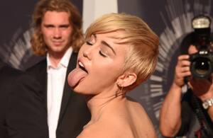 Miley Cyrus Celebrity Porn Tabloid - Miley Cyrus' 10 Biggest Scandals