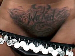 black ghetto pussy tattoo - Busty ebony babe with tattooed pussy getting banged by fat black cock.