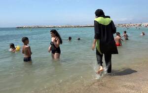 french nudist beach activity - French nudist beach becomes latest to ban burkinis