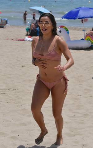 milf nude beach video - Eva Longoria shows off her pert bum and slender frame as she hits the beach  in a pink bikini on holiday | The Sun