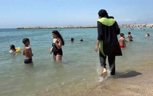 europe nudist sunbathing - French nudist beach becomes latest to ban burkinis