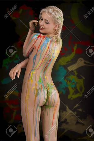 Body Paint Naked Blonde Porn - beautiful blond nude girl with multicolored body paint over her body  smiling with sexy pose against