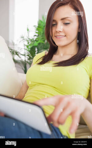 joyful brunette asian - Happy brunette girl sitting smiling hi-res stock photography and images -  Alamy
