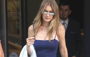 Michelle Ryan Tits Bouncing Braless - Candids of a braless Gigi Hadid wearing a tight blue top while out and  about in NYC, and also posing next to her V magazine cover. View the  pictures