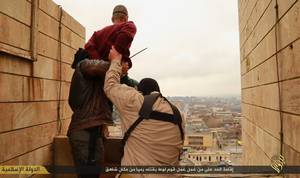 Isis Muslim Gay Porn - A man accused of homosexuality is led to the edge of a tall building by  Islamic