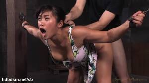 asian chained up sex - Chained up Asian babe experiences rough hammering for her cunt and mouth @  goBDSM
