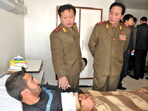 North Korean Army Porn - North Korean officers visit Syrian government wounded soldiers in Damascus  hospital in 2012 (Photo:
