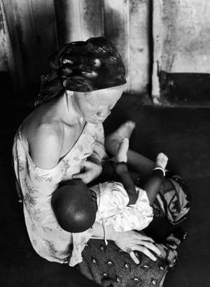 lactating black girl enslaved - The bond between mother and child is absolute in this tender moment when  breastfeeding. Nothing