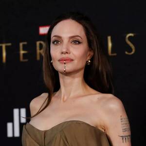angelina jolie sucking cock - Angelina Jolie baffles fans as she wears metal chin cuff to Eternals  premiere - Daily Star