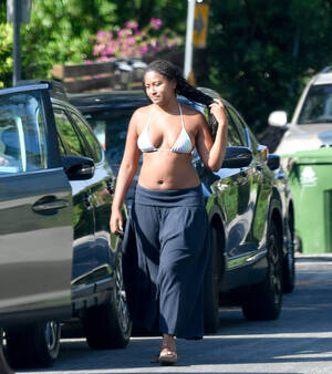 Michelle Obama Tits - Sasha Obama wears bikini top, oversize pants as she smokes cigarette