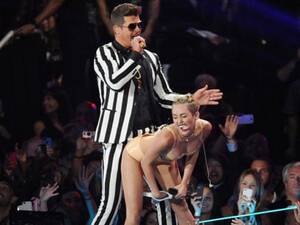 Miley Cyrus Sex Porn - MTV VMAs: Miley Cyrus performance sparks criticism - video | Music | The  Guardian