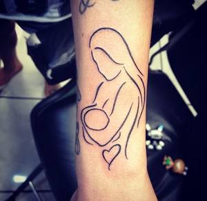 lactating tattooed - 18 Tattoos That Capture the Magic of Breastfeeding