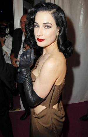 Leather Glove Sexy - Dita Von Teese may now be an A-list celebrity, sitting front row at Paris  Fashion Week and posing for the cover of Harper's Bazaar, but she clearly  hasn't