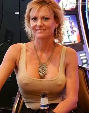 blonde pierced pussy upskirt - Mature blonde pierced nipple pokies at casino