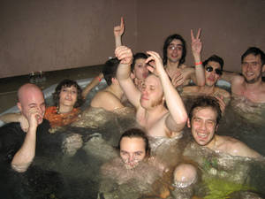 folks party in hot tub - not one but two! this seems kind of \