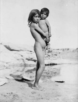 indian girl naked - File:Nude pueblo Indian girl holding small child.jpg - Wikimedia Commons