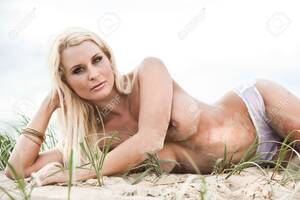 hot naked tanned beach babes - Sexy Topless Girl With Great Tan On The Sandy Beach Stock Photo, Picture  and Royalty Free Image. Image 4813265.