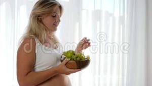 eating pregnant belly nude - Diet During Pregnancy, Girl With Big Naked Tummy Holds Wooden Plate With  Fruits And Eats Grapes Stock Video - Video of mother, maternity: 105828175