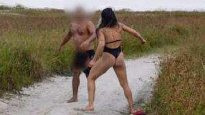 masturbation nude beach - MMA fighter beats up creep masturbating during her beach photoshoot
